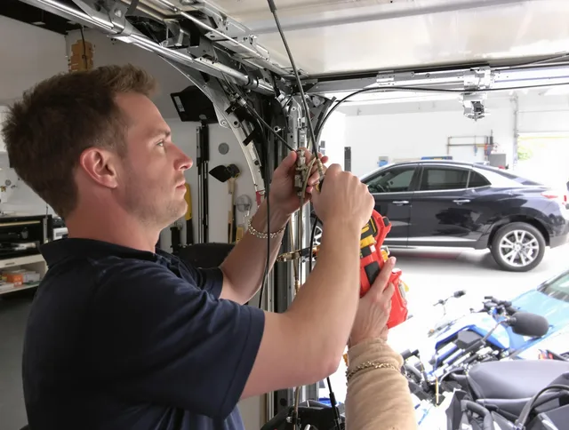 Chino Garage Door Repair safety certified technician performing cable replacement in Chino