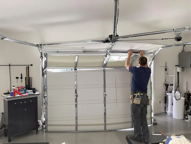 Chino Garage Door Repair specialist performing precise section replacement on Chino garage door