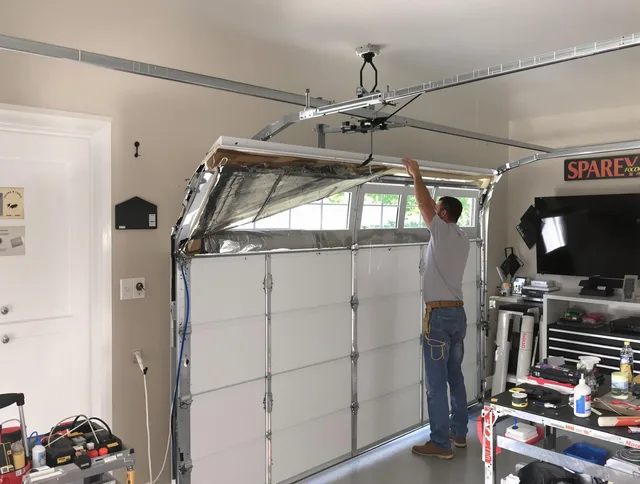 Garage door section replacement by Chino Garage Door Repair in Chino
