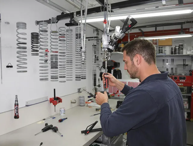 Chino Garage Door Repair safety certified technician performing precision spring replacement in Chino
